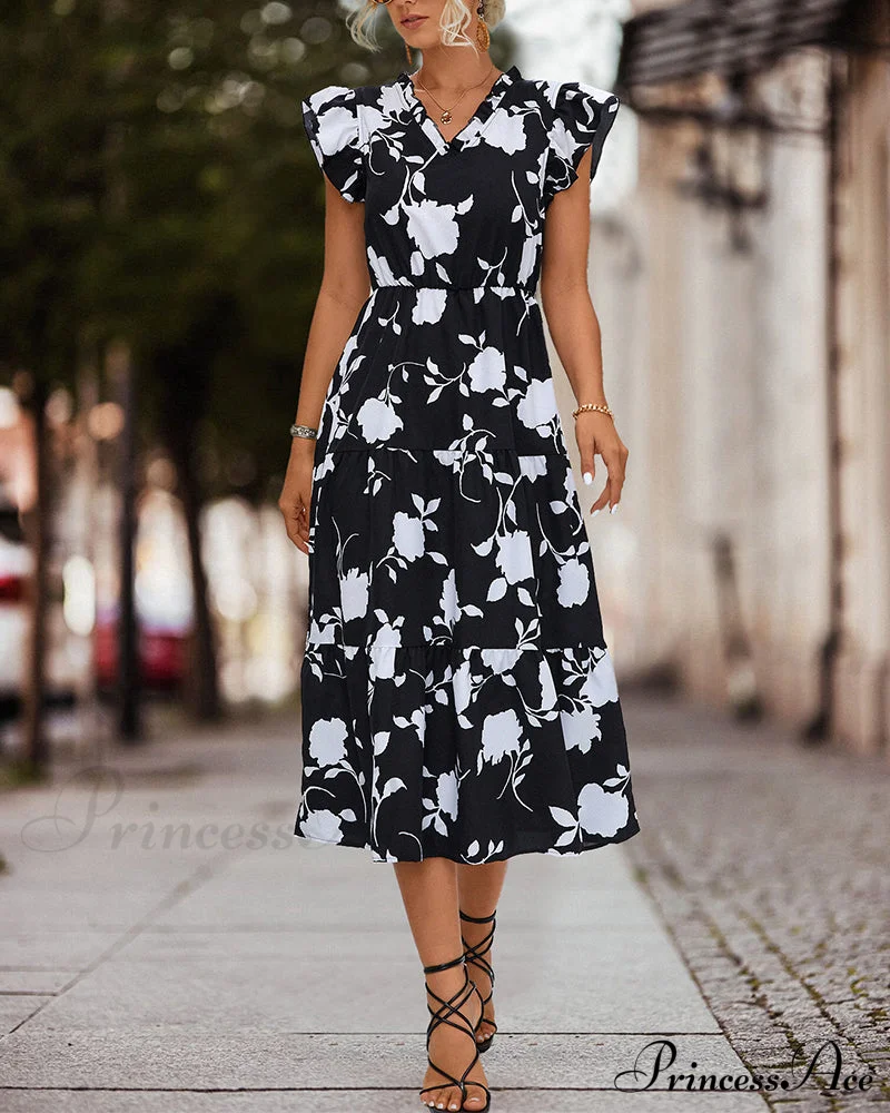 Floral dress with ruffled sleeves